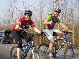 Cassie and Ben cycling along