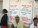 People queuing for treatment