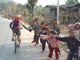 children 'high-five' as we pass